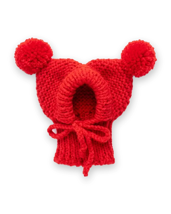 Red knitted dog hood with two pom-poms